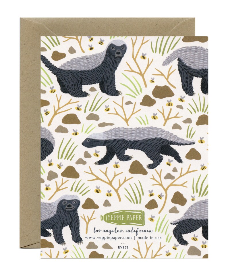 May include: A white card with a repeating pattern of honey badgers and bees. The honey badgers are black and gray with white stripes. The bees are yellow and black. The card has the text "YEPPIE PAPER" in green and the text "los angeles, california" in black. The card also has the text "www.yeppiepaper.com | made in usa" in black. The card has the text "EVI75" in black.