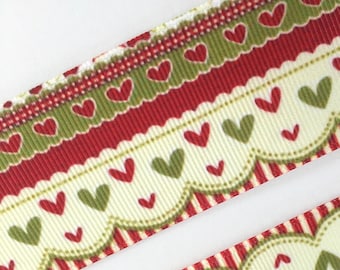 May include: Red and green ribbon with a repeating pattern of hearts. The hearts are in a scalloped design with a white background.