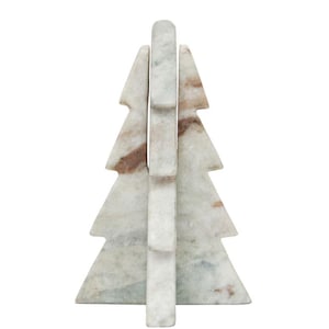 May include: A white marble Christmas tree ornament with brown marbling. The tree is made of three pieces that fit together.