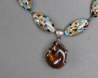 Confetti - Fire Agate and Lampwork.  Light makes  the agate to glow with fiery glamor.