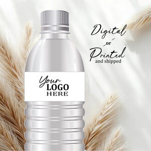May include: A clear plastic water bottle with a white label that says "Your LOGO HERE". The bottle has a gray cap and is surrounded by beige decorative elements. The words "Digital or Printed and shipped" are written in black script.
