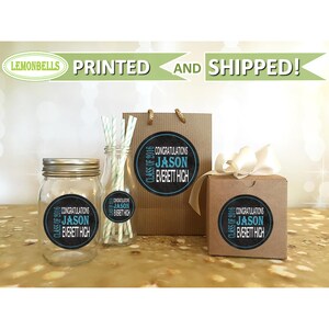 May include: Class of 2016 graduation party favor stickers with a black chalkboard background and blue text. The stickers say "Congratulations Jason Everett High" and are shown on a mason jar, a glass bottle, a gift bag, and a gift box.