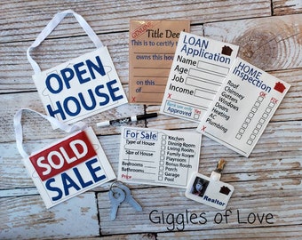 May include: A set of play pretend real estate signs for kids. The signs include "Open House", "Sold", "For Sale", "Loan Application", and "Home Inspection". There is also a realtor name tag and a key.