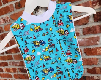 Infant or Toddler Pull Over Bib (Flannel and Terry Cloth) - Construction Vehicles on Teal