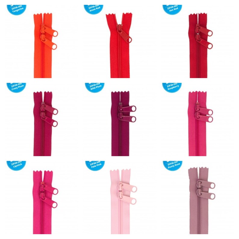 May include: Nine different colors of zipper pulls, each with a different color name label. The colors are: Tangerine, Atom Red, Crazy Plum, Wild Plum, Raspberry, Lipstick, Pale Pink, and Dusty Rose.