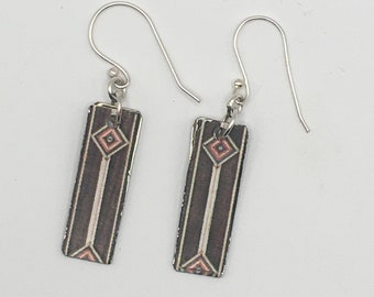 Pierced earrings made from decorative tin