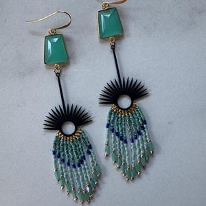 Pendientes negros y azules