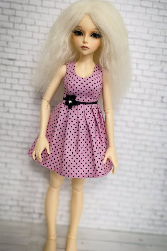 pink dress with black polka dots