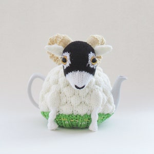 Modello a maglia accogliente di Swaledale Sheep Tea
