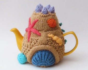 TeaCosyFolk's Sandcastle Tea Cosy Knitting Pattern to knit your own beach inspired teapot cover