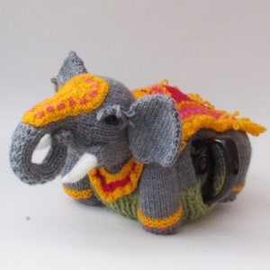 Beautiful Festival Elephant Tea Cosy Knitting Pattern to knit your own Elephant teapot warmer with colourful festival decorations