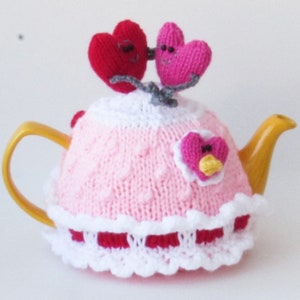 TeaCosyFolk's In Love Hearts Tea Cosy Knitting Pattern to knit a Valentine or 7th wedding anniversary teapot cosy with love heart characters