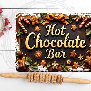 May include: A festive sign reading "Hot Chocolate Bar" with gold lettering, decorated with gingerbread biscuits, candy canes, and holly. A wooden rolling pin is at the bottom. A bowl of flour is to the left.