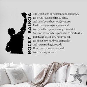 May include: Black and white silhouette of Rocky Balboa with a motivational quote from the movie "Rocky". The quote reads: "The world ain't all sunshine and rainbows. It's a very mean and nasty place, and I don't care how tough you are, It will beat you to your knees and keep you there permanently if you let it. You, me, or nobody is gonna hit as hard as life But it ain't about how hard you hit. It's about how hard you can get hit and keep moving forward; How much you can take and keep moving forward."