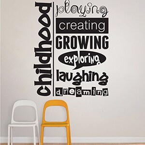 May include: Black and white wall decal with the word "childhood" vertically down the left side and the words "playing", "creating", "growing", "exploring", "laughing", and "dreaming" in a vertical column on the right side.