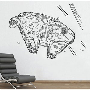 May include: A black and white line drawing of the Millennium Falcon spaceship from Star Wars. The spaceship is flying through space, with a few lines representing the stars.