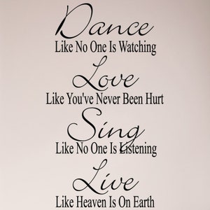 May include: Black and white typography wall decal with the quote "Dance like no one is watching, Love like you've never been hurt, Sing like no one is listening, Live like heaven is on earth."