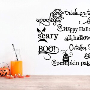 May include: Black and white Halloween themed wall decals with phrases like "trick or treat", "spooky", "bats", "Happy Halloween", "scary", "BOO!" and "pumpkin patch".