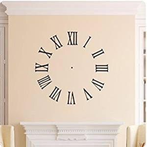 May include: Black Roman numeral clock face wall decal. The decal is a circle with black Roman numerals around the edge. The center of the circle has a small black dot.
