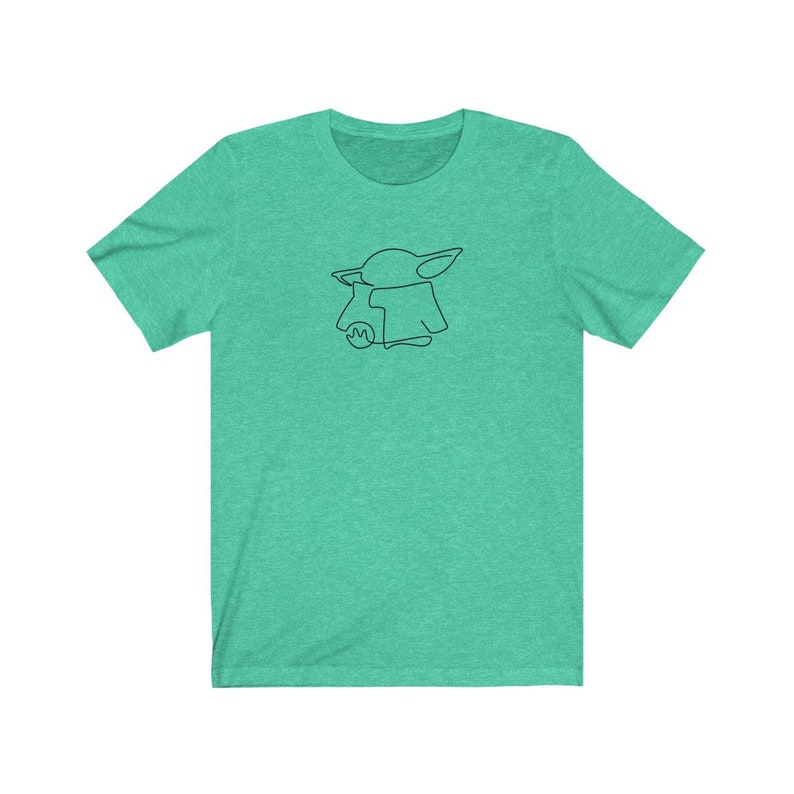 May include: A teal green t-shirt with a black line drawing of a cartoon character with large ears and a pointed head.