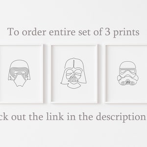May include: Three black and white line art prints of Star Wars characters: Darth Vader, Kylo Ren, and a Stormtrooper. The prints are framed in white frames and are hanging on a white wall. The text "To order entire set of 3 prints check out the link in the description box" is below the prints.