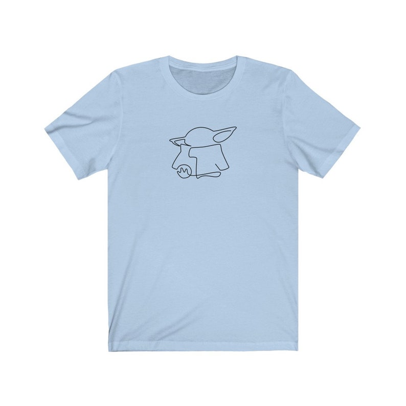 May include: A light blue t-shirt with a black line drawing of a character from the Star Wars franchise, The Mandalorian, known as "The Child" or "Baby Yoda".