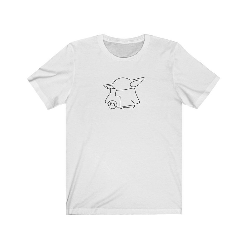 May include: White t-shirt with a black line drawing of a character from the Star Wars franchise, The Mandalorian.