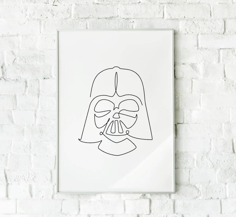 May include: A black and white line drawing of Darth Vader's helmet in a white frame against a white brick wall.
