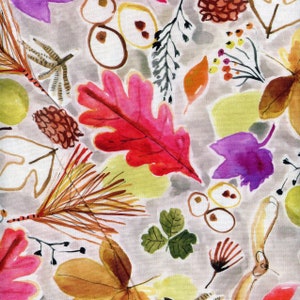 May include: A watercolour pattern with leaves, pine cones, and berries in red, purple, yellow, and green. The design includes various leaf shapes and botanical elements on a light grey background.