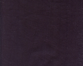 May include: A square, dark purple fabric with a textured surface. The color is a deep, rich shade, with subtle variations in tone across the material. The fabric appears to be slightly wrinkled or creased, adding to its visual interest.