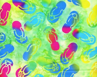 May include: A fabric pattern featuring a repeating print of flip-flops in various colors including hot pink, bright blue, and yellow. The flip-flops are scattered across a mottled, light green background with a watercolor-like texture.