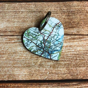 May include: A heart-shaped map keychain with a silver key ring. The map shows the area around Marlow, England. The map is printed on a white background with black lines and text.