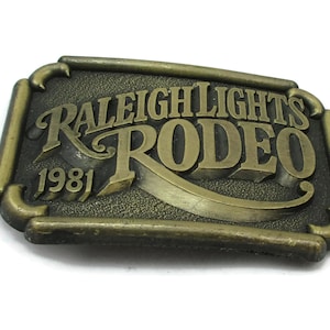 Raleigh Lights 1981 Rodeo Brass Belt Buckle Cigarette  NOS  Gift Idea  Wear Vintage 1970 Western Wear Trucker Gift Idea Mens Accessories