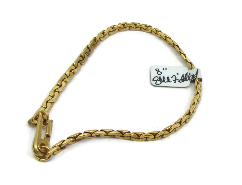 Gold Tone Clasp Bracelet 8 Inches Long Unisex Jewelry Mod Designer Signed Classic Vintage Costume Jewelry
