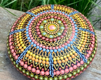 Hand painted dot art mandala stone in orange, lime and gold