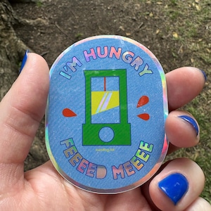 Hungry Guy Guillotine Holographic Sticker