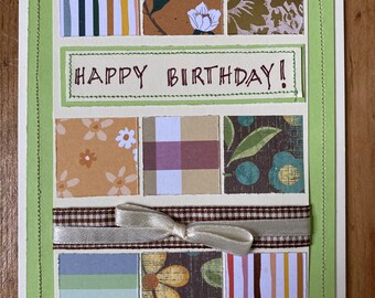 Happy Birthday card- handmade and stitched with browns and gold on light green card-  colorful papers and ribbon