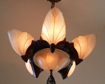 Antique bronze Art Deco chandelier with slip shades from 1930's