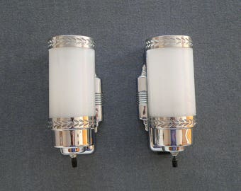 Pair of antique Art Deco sconces with original slip shades by Lightolier