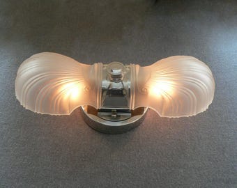 Antique Art Deco bathrom sconce made by Lightolier