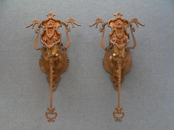 Antique pair of Bronze Art Deco sconces with mica shade