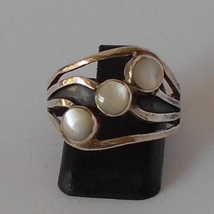 Handmade Sterling 925 silver and Mother of Pearl silver ring.