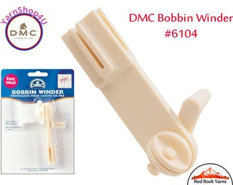 DMC Bobbin Winder #6104. For use with plastic or cardboard bobbins. Made of Plastic