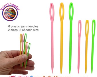 6 plastic yarn needles. 3 of each size: large and regular. Good for bulky and medium weight yarn.