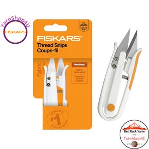 May include: Fiskars thread snips with an orange and white handle. The package is orange and white with the text "Fiskars Thread Snips Coupe-fil". The snips have a built-in blade guard and are labeled "UltraSharp".
