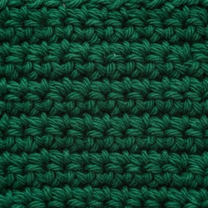 May include: Close-up of a green crocheted fabric with a textured, woven pattern.