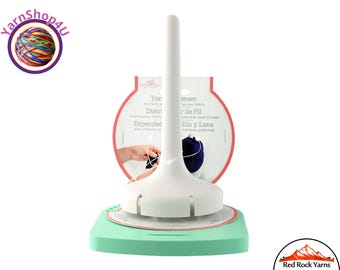 Yarn Dispenser. a rotating base spins to release as you work as you pull yarn. The Spindle height is about 6". Plastic. Made in the USA