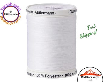 Gutermann Thread Nu White - 1094 yards / 1000 meters. White Sew-All All Purpose Polyester Thread. This is a big spool of sewing thread. #20