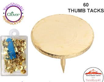 60 Brass Thumb TackS. These are brass plated about 3/8" diameter. Includes acrylic case with blue tack Remover. Clover NP100H