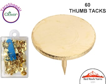 60 Brass Thumb TackS. These are brass plated about 3/8" diameter. Includes acrylic case with blue tack Remover. Clover NP100H